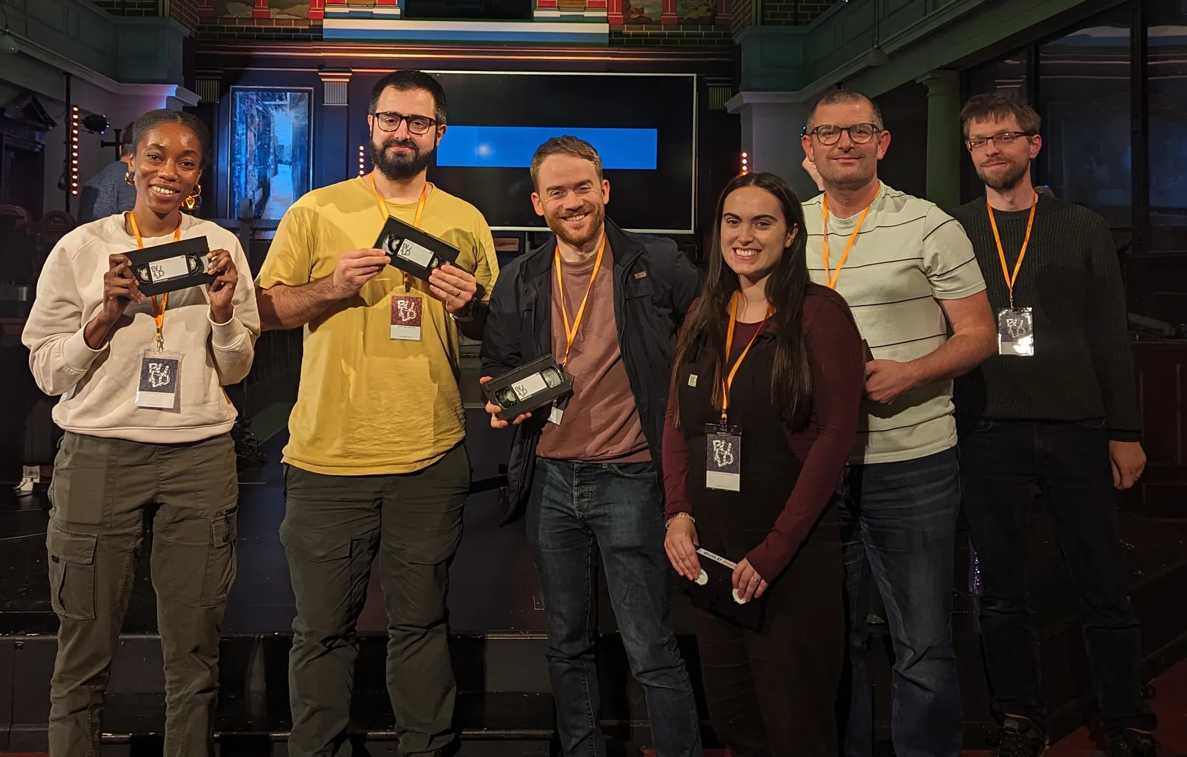A project team on stage at a past BUILD weekend
